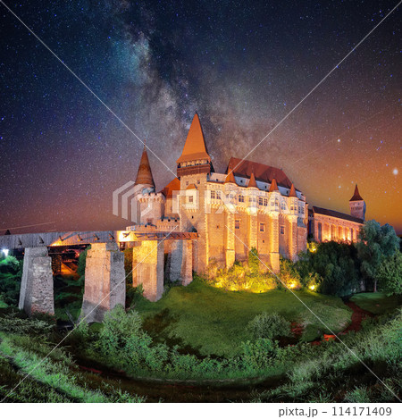 Fabulous night scene of Hunyad Castle / Corvin's Castle with wooden bridge Fabulous night scene of Hunyad Castle / Corvin's Castle with wooden bridge 114171409