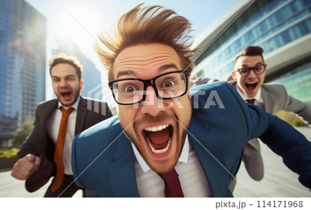 Running joyful businessman with colleagues business people having a race together in the office 114171968