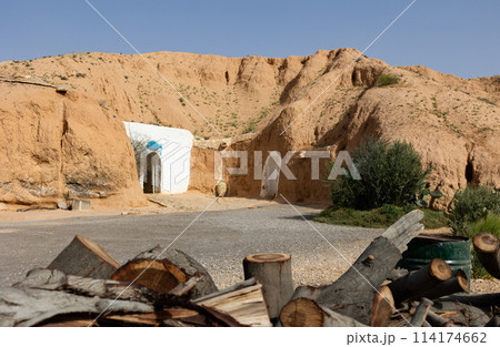 Dwelling of people, representatives of troglodyte tribe east of Sahara Desert. Dwelling of people, representatives of troglodyte tribe east of Sahara Desert. 114174662