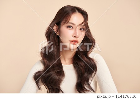 Beautiful young asian woman with clean fresh skin on beige background, Face care, Facial treatment, Cosmetology, beauty and spa, Asian women portrait. Beautiful young asian woman with clean fresh skin on beige background, Face care, Facial treatment, Cosmetology, beauty and spa, Asian women portrait. 114176510