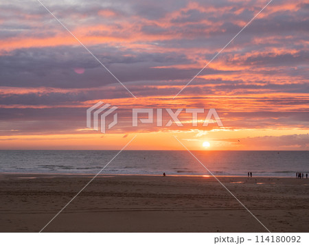 Oostende, Belgium - July 31st 2023: View over the city beach during sunset. 114180092