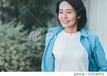 a forty-something woman a forty-something woman 114180351