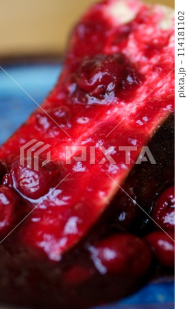 The confectioner serves a piece of no bake cherry cheesecake. 114181102