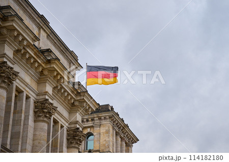 National flag of Germany on Reichstag building in Berlin National flag of Germany on Reichstag building in Berlin 114182180