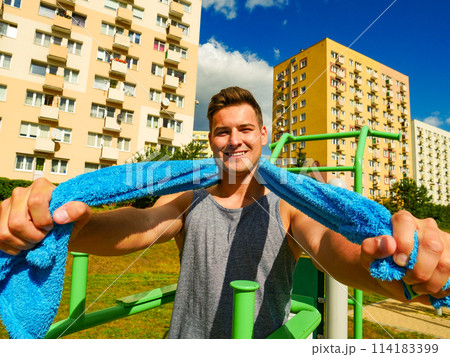 Young man relaxing after outdoor workout 114183399