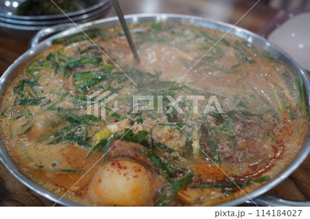 Korean traditional food. Pork Back-bone Stew is a thick traditional Korean food made with pork spine, potatoes, and various vegetables. 114184027