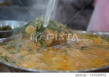 Korean traditional food. Pork Back-bone Stew is a thick traditional Korean food made with pork spine, potatoes, and various vegetables. 114184032