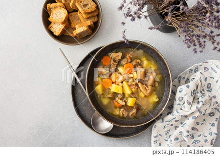 Oyster mushroom soup in plates 114186405