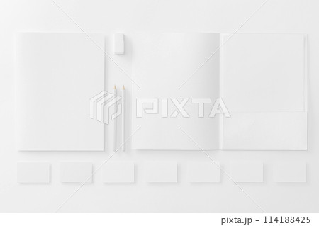 Corporate stationery set mockup. Presentation folders, letterhead and business cards row at white textured paper background. Corporate stationery set mockup. Presentation folders, letterhead and business cards row at white textured paper background. 114188425