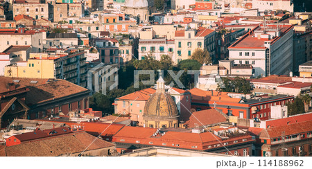 Naples, Italy. Top View Cityscape Skyline With Famous Landmarks In Sunny Day. Many Old Churches And Temples Naples, Italy. Top View Cityscape Skyline With Famous Landmarks In Sunny Day. Many Old Churches And Temples 114188962