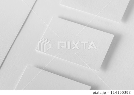 Corporate stationery set mockup. Letterhead and three business cards at white textured paper background. 114190398