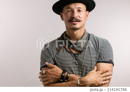 Closeup of confident happy man over studio white background Closeup of confident happy man over studio white background 114191786