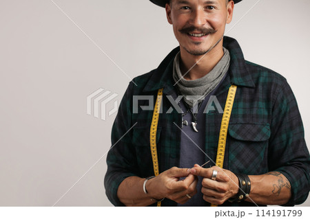 Closeup of confident happy man over studio white background Closeup of confident happy man over studio white background 114191799