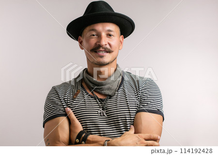 Closeup of confident happy man over studio white background Closeup of confident happy man over studio white background 114192428