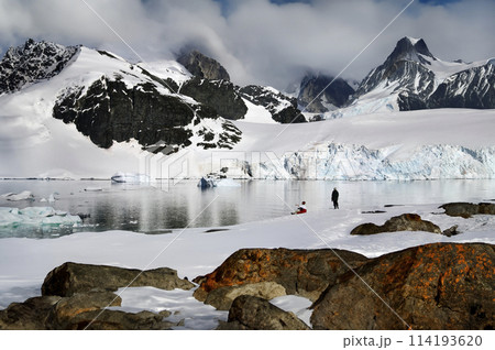 Adventure tourists in Antarctica 114193620