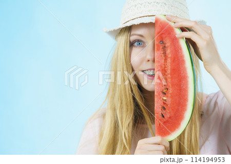 woman holding watermelon fruit 114194953