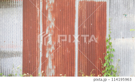 Texture of rusty galvanized metal roof sheets background Texture of rusty galvanized metal roof sheets background 114195963