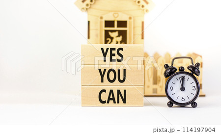 Motivational and Yes you can symbol. Concept words Yes you can on beautiful wooden blocks. Beautiful white background. Black alarm clock. Business motivational and Yes you can concept. Copy space. Motivational and Yes you can symbol. Concept words Yes you can on beautiful wooden blocks. Beautiful white background. Black alarm clock. Business motivational and Yes you can concept. Copy space. 114197904