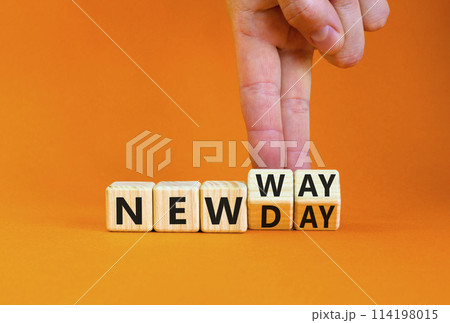 New day and way symbol. Concept word New day New way on beautiful wooden cubes. Beautiful orange table orange background. Businessman hand. Business new day and way concept. Copy space. 114198015