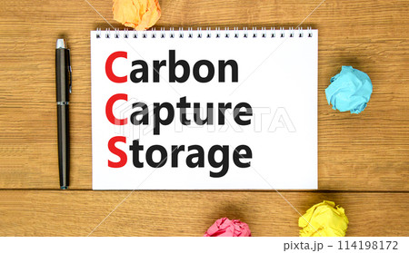 CCS Carbon capture storage symbol. Concept words CCS Carbon capture storage on beautiful white note. Beautiful wooden table background. Business ecological Carbon capture storage concept. Copy space. 114198172
