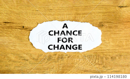 A chance for change symbol. Concept words A chance for change on beautiful white paper. Beautiful wooden background. Business A chance for change concept. Copy space. A chance for change symbol. Concept words A chance for change on beautiful white paper. Beautiful wooden background. Business A chance for change concept. Copy space. 114198180