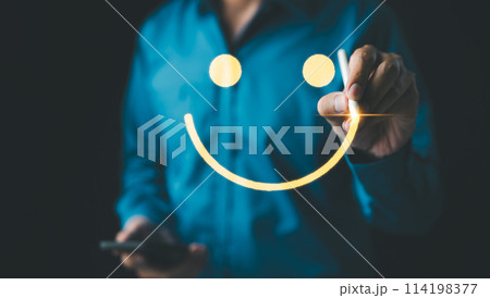Customer review satisfaction feedback survey concept. Man using a pen to draw happy smiling face on a virtual screen. Service product evaluation business, Positive thinking, Mental health assessment, 114198377