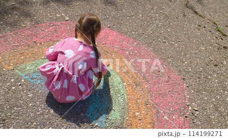 child hand drawing chalk asphalt, child kid childhood dream, little artist playground park girl daughter, girl drawing pavement, outdoor creative expression, child chalk play, outdoor recreation 114199271