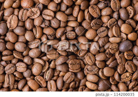 Roasted coffee as a background. Coffee beans. 114200035