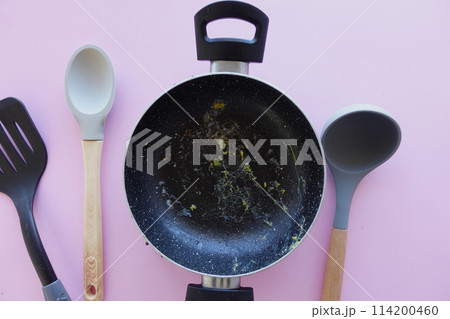 A Dirty Frying Pan top view  114200460
