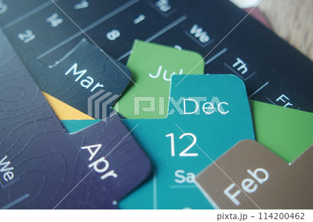 detail shot of a calendar on table, 114200462
