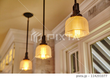 Elegant Pendant Lights in Modern Interior, Warm Glow Atmosphere 114201077