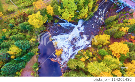 Aerial View of Eagle River Falls Amidst Autumn Foliage in Michigan 114201450
