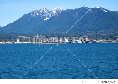 Canada Place and commercial buildings in downtown Vancouver port and pier liner ships arrive people strolling view skyscrapers tall buildings ocean beauty fresh air blue sky without clouds Canada Place and commercial buildings in downtown Vancouver port and pier liner ships arrive people strolling view skyscrapers tall buildings ocean beauty fresh air blue sky without clouds 114202732