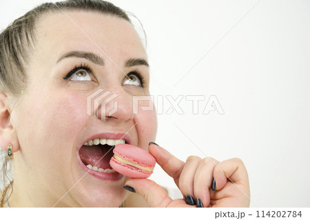 banner pastry shop cooking show courses training to cook sweet dessert satisfied and happy woman eating macaroons ad sweets goodies pleasant life pleasure buzz joy smile overweight model size plus 114202784