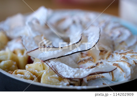 Squirrel and raspberry pancakes Melting butter on hot thick pancakes. A tower of the thick American pancakes.  114202909