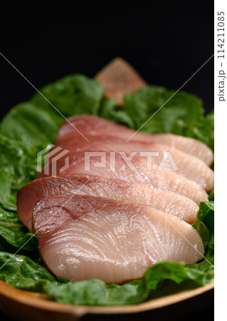 Shime Saba or raw mackerel salted and marinated in vinegar on black plate. Japanese food style 114211085
