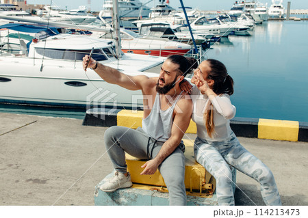 Sportive couple on Seaside Summer Vacation, taking selfie photo. Sportive couple on Seaside Summer Vacation, taking selfie photo. 114213473