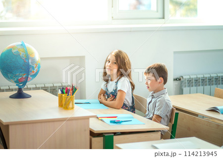 school children participating actively in class. Education, learning, high school 114213945