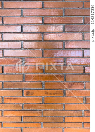 Red glossy brick wall background Red glossy brick wall background 114217356