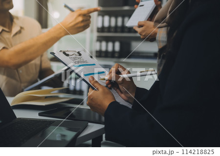 Finance manager meeting discussing company growth project success financial statistics, professional investor working start up project for strategy plan with document, laptop and digital tablet. 114218825