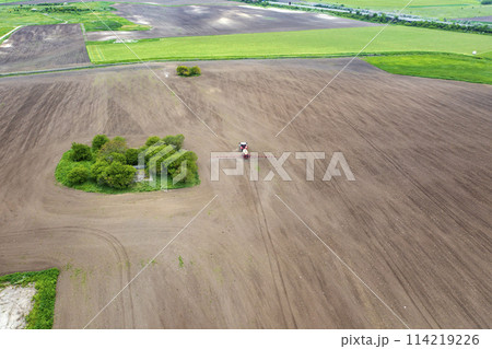 tractor spraying aerosol  114219226