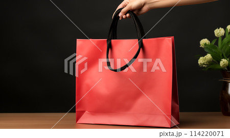 Woman Hand Holding red Paper Shopping Bag on Black Background Sale Delivery Concept AI Generated 114220071