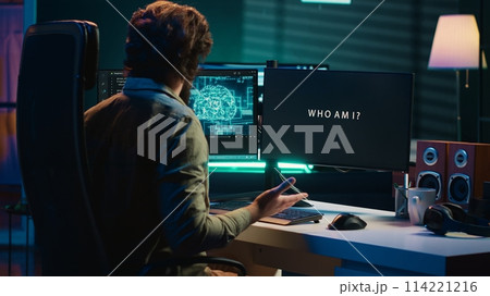 AI becoming sentient, talking with programmer, asking questions about itself. Concept of artificial intelligence wishing to befriend humanity after becoming self aware, communicating, camera A 114221216
