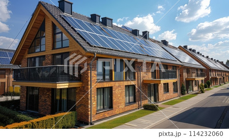 residential building on European street with solar panels installed on the roof. summer. Realistic photography. residential building on European street with solar panels installed on the roof. summer. Realistic photography. 114232060