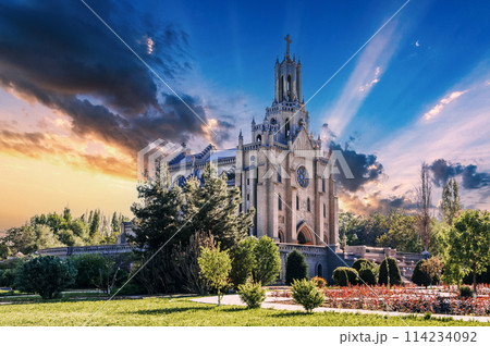 Cathedral of Sacred Heart of Jesus in Tashkent. Ancient Roman Catholic Church in Uzbekistan on background of a cloudy blue sky at sunset in spring Cathedral of Sacred Heart of Jesus in Tashkent. Ancient Roman Catholic Church in Uzbekistan on background of a cloudy blue sky at sunset in spring 114234092