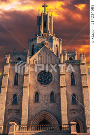 facade of the Cathedral of Sacred Heart of Jesus on background of a dramatic sky at sunset. Roman Catholic Church in gothic style in Tashkent in Uzbekistan facade of the Cathedral of Sacred Heart of Jesus on background of a dramatic sky at sunset. Roman Catholic Church in gothic style in Tashkent in Uzbekistan 114234095