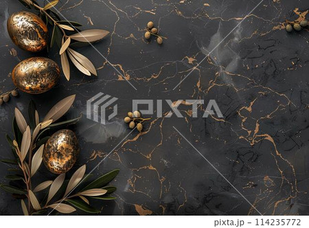Golden easter eggs with gold leaves on black marble background. Top view with copy space. Happy Easter concept  114235772