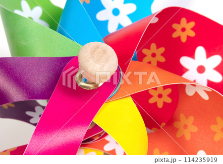 Colorful pinwheel, spinning toy with wooden stick 114235919