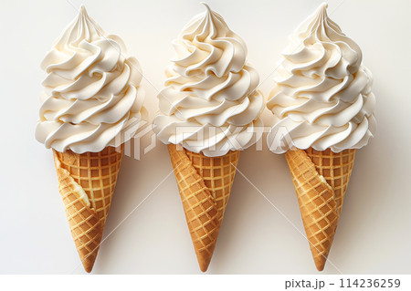 A single scoop of vanilla ice cream on a waffle cone. 114236259