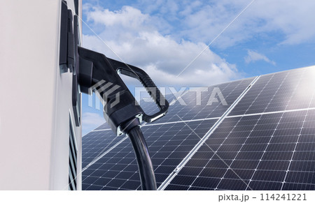 Electric vehicles charging station that takes energy from solar panels. Close up.. 114241221